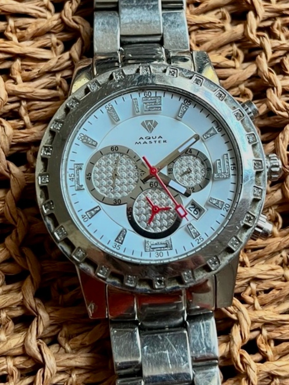 Stainless Steel Silver Watch with White Dial and Red Accents